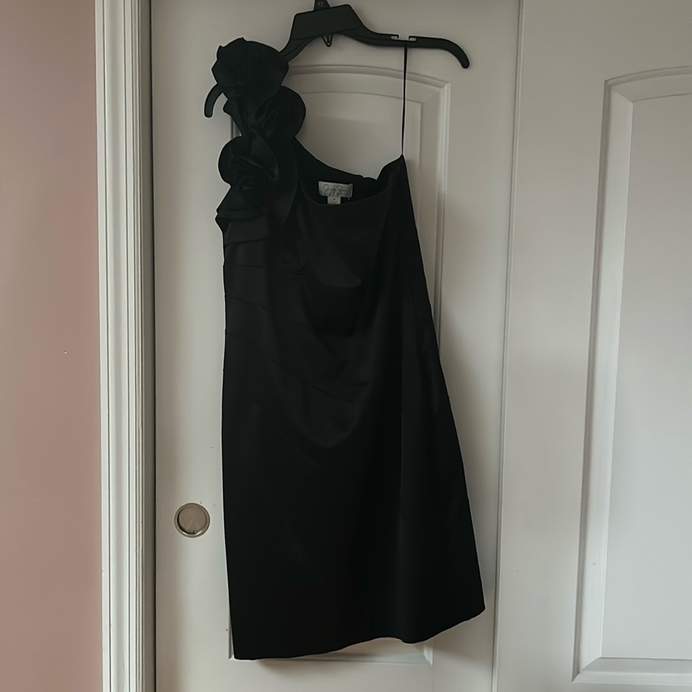 Jessica Simpson one shoulder satin dress. Rose detail. Slender lines thru dress
